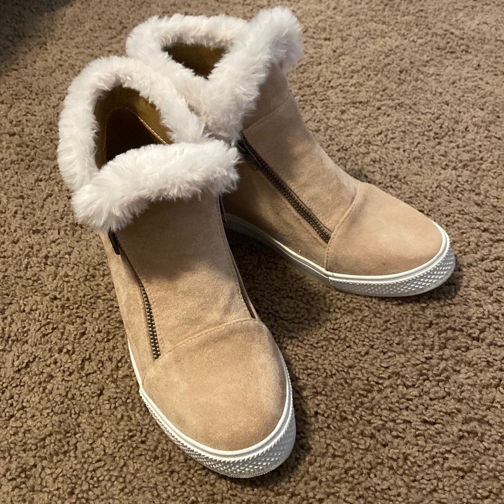 Bought from a boutique. Really light pink wedge